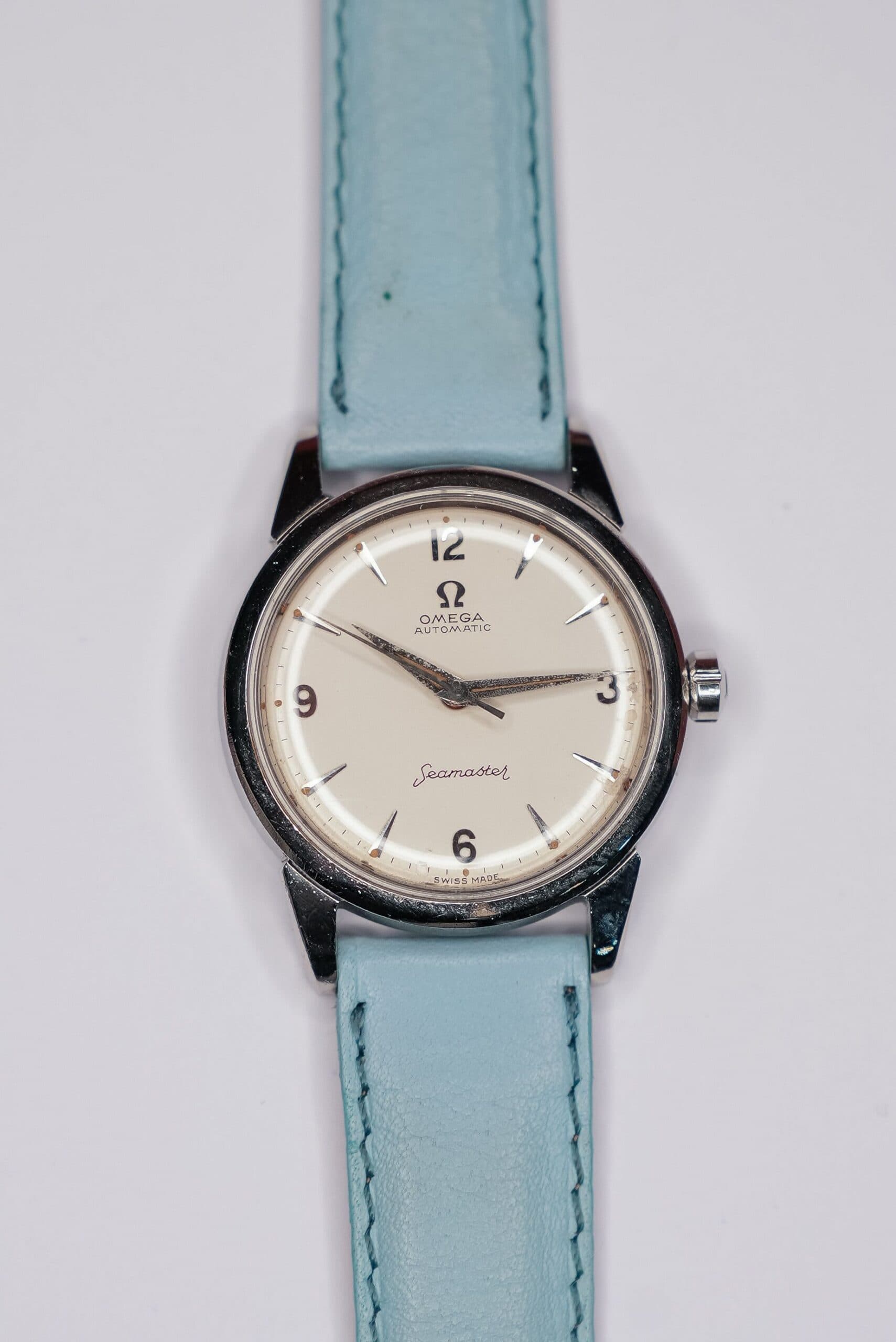 Omega Seamaster cream dial on pale blue leather strap
