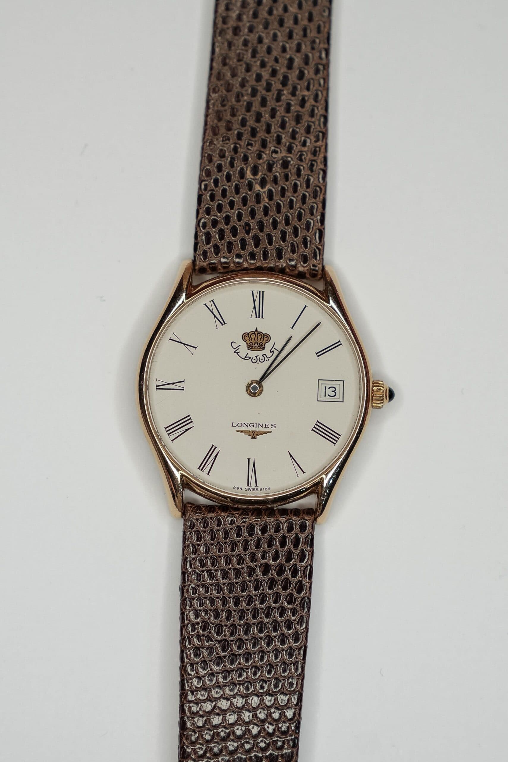 Longines ivory dial watch on brown lizard strap